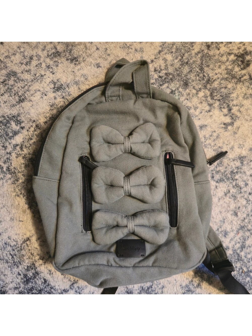 Noir Voyage Olive Green Canvas Backpack with Bow Accents and Pink Interior